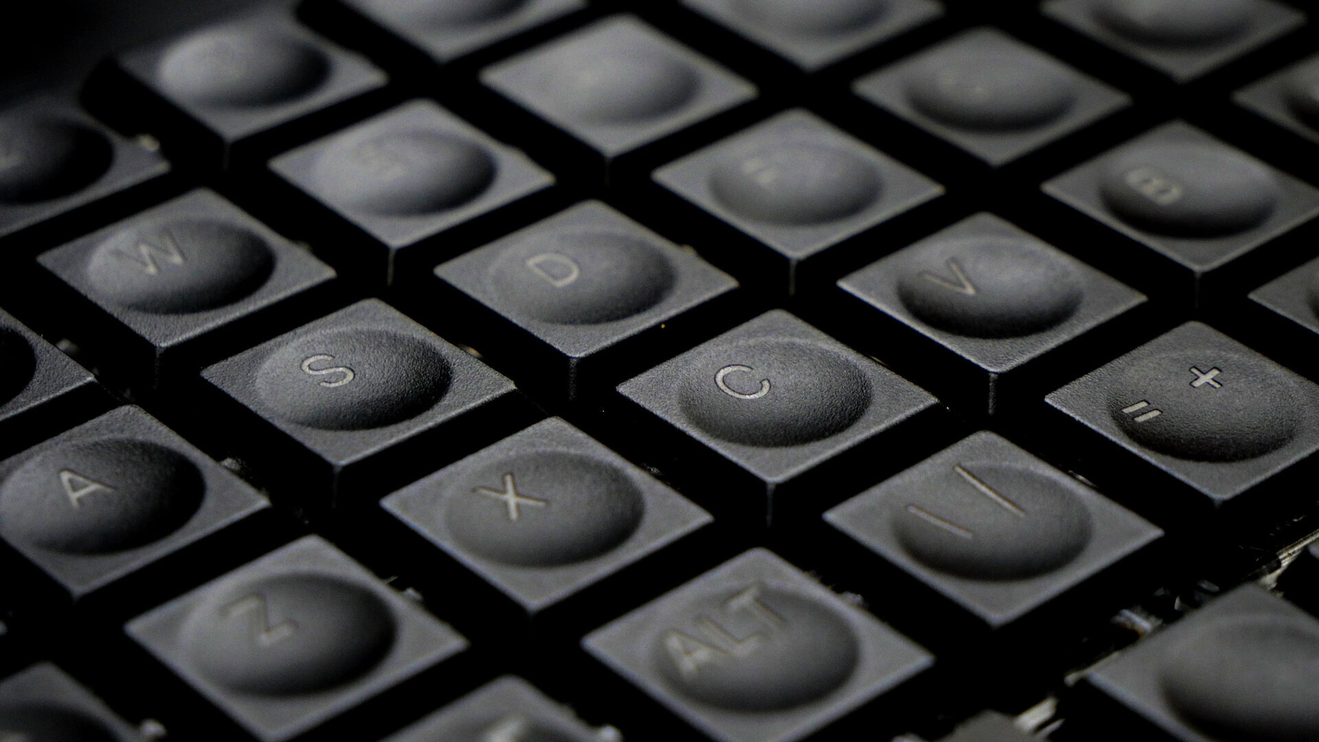 Closeup of MNT Pocket Reform Keycaps, engraved