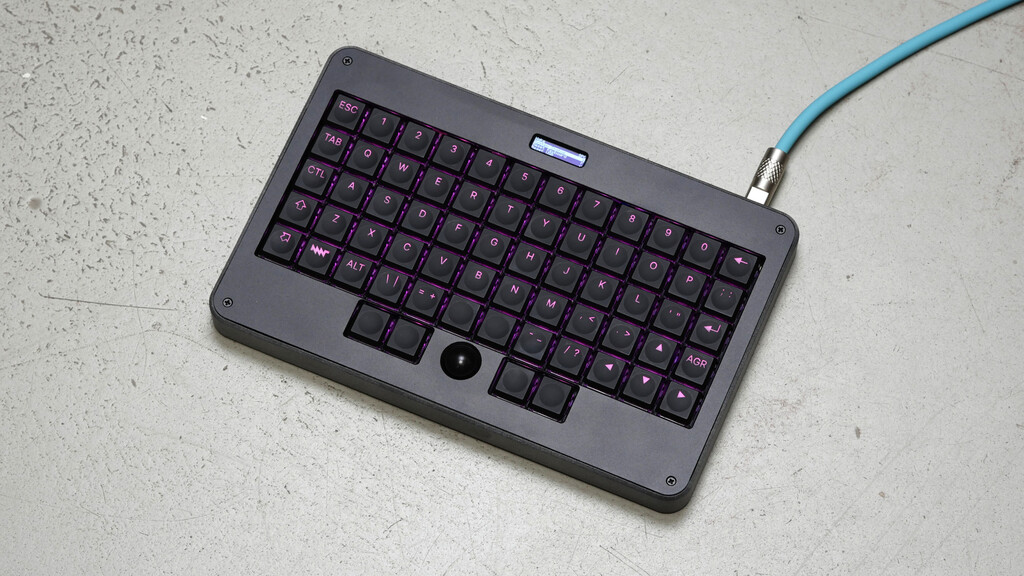 Wired MNT Pocket Reform Standalone Keyboard with pink backlight
